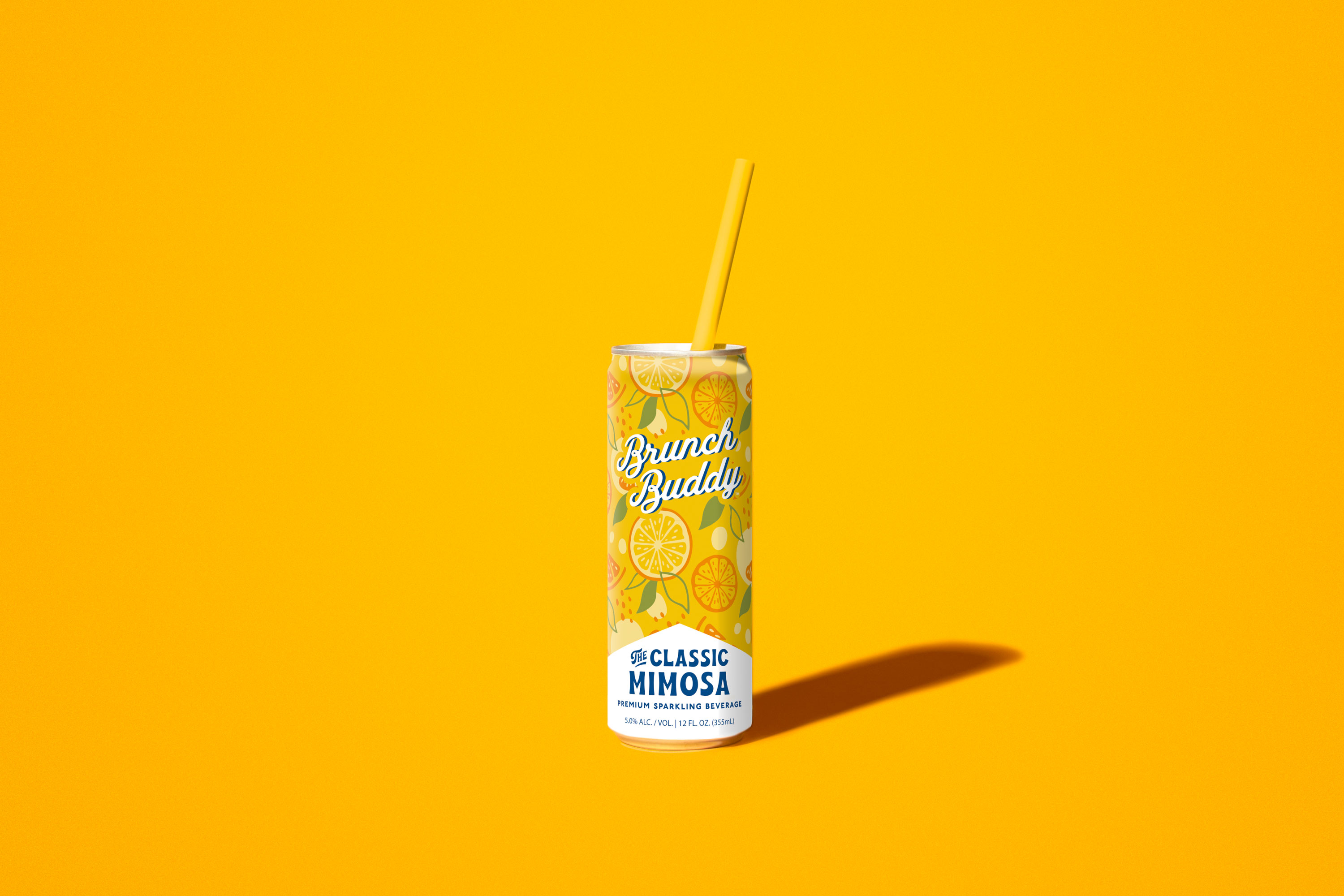 Product photo of a can of brunch-themed alcoholic beverage, named 'brunch-buddy' on a yellow background.